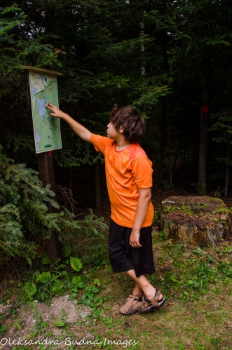 looking at a trail map at Quetico Provincial Park